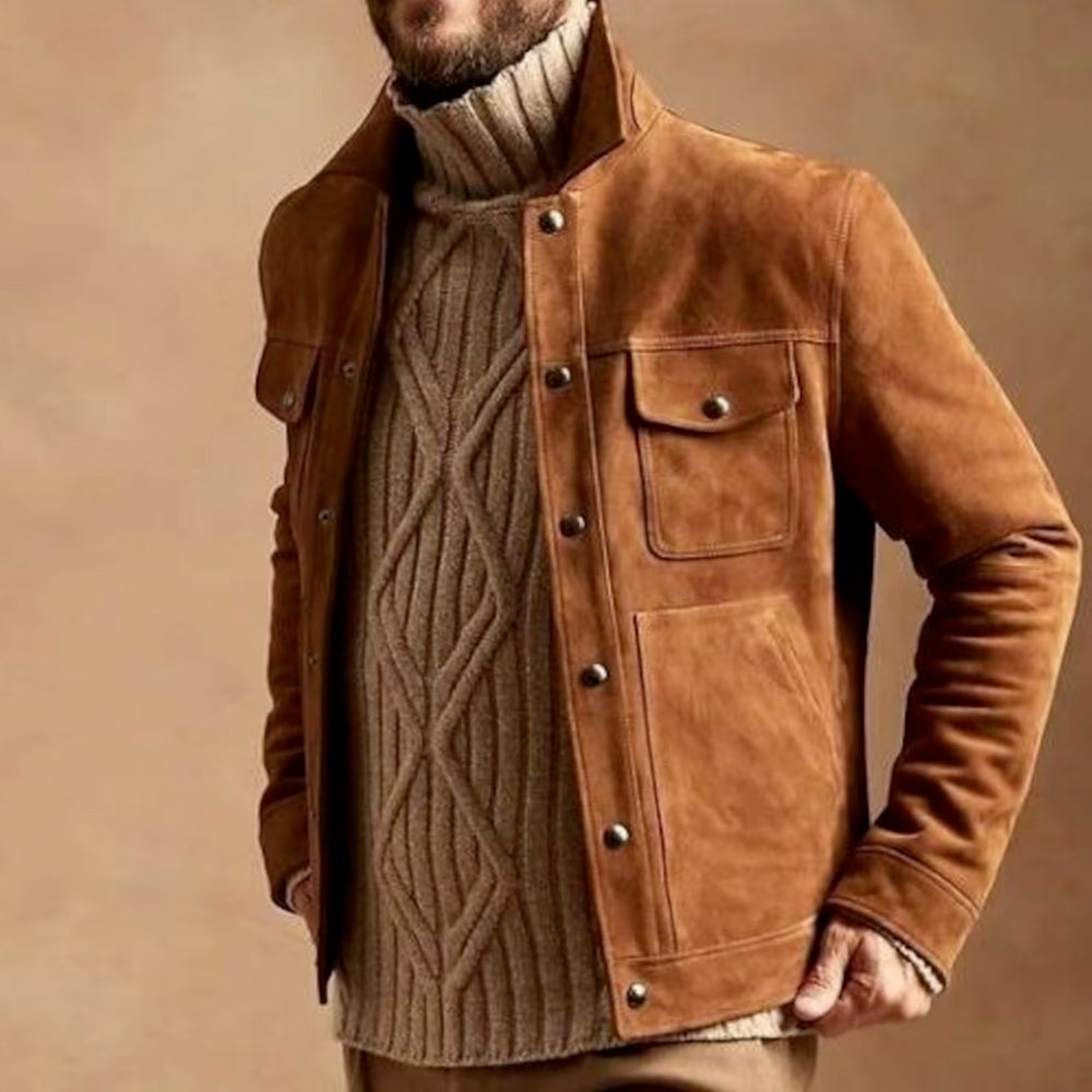 Man wearing a brown suede leather jacket, standing in a slight side pose with a confident look.