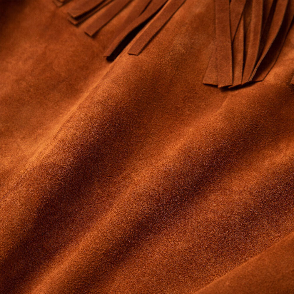 Close-up shot of the premium suede leather texture, emphasizing the high-quality material of the Western Fringe Jacket.