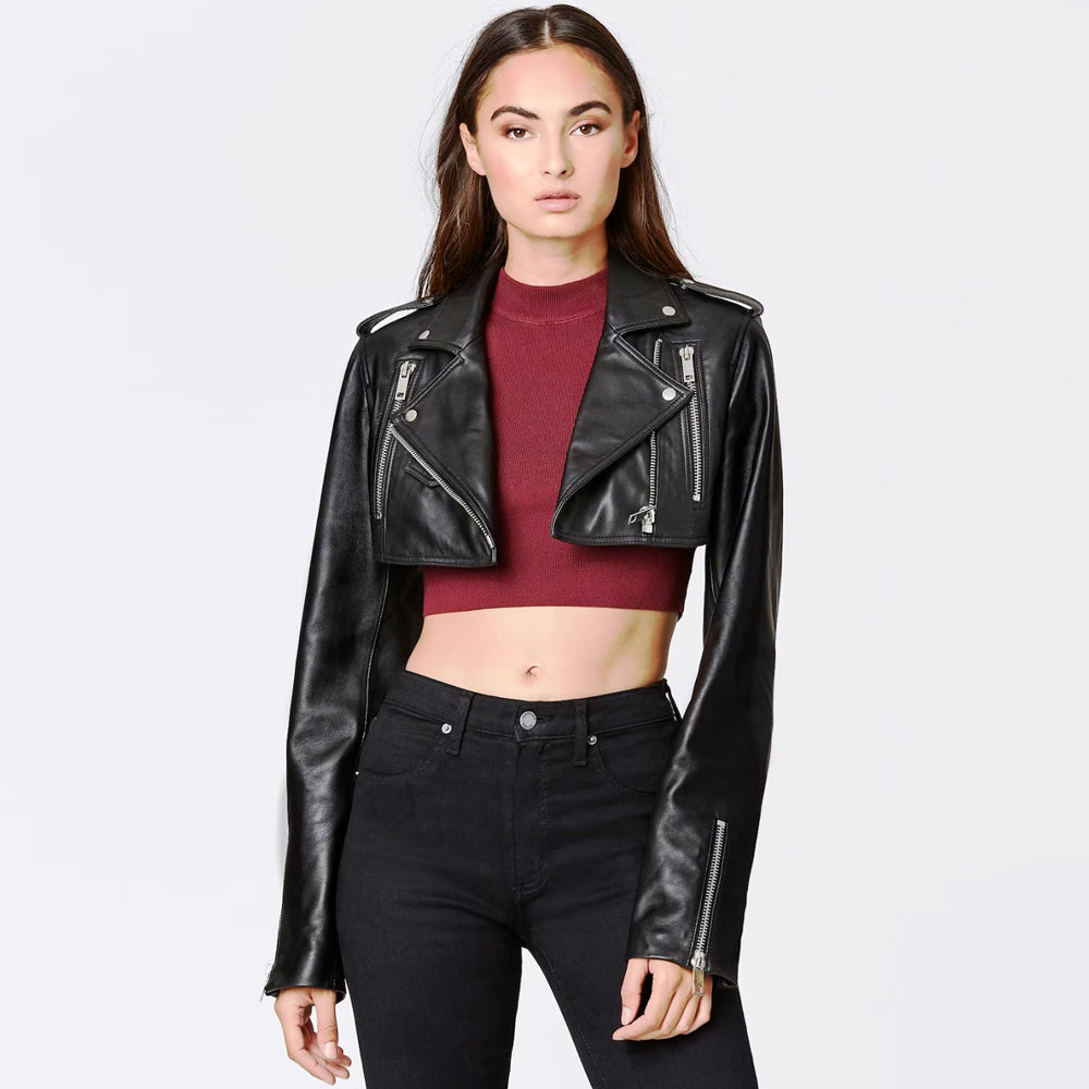 Woman wearing black cropped leather bolero jacket with front zip open, front view.