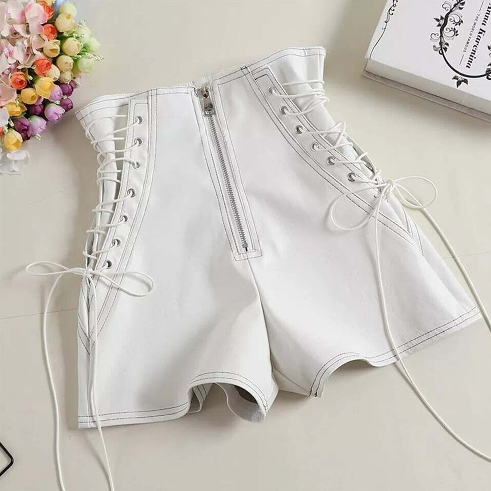 Women's white leather shorts with lace-up sides and zipper back.