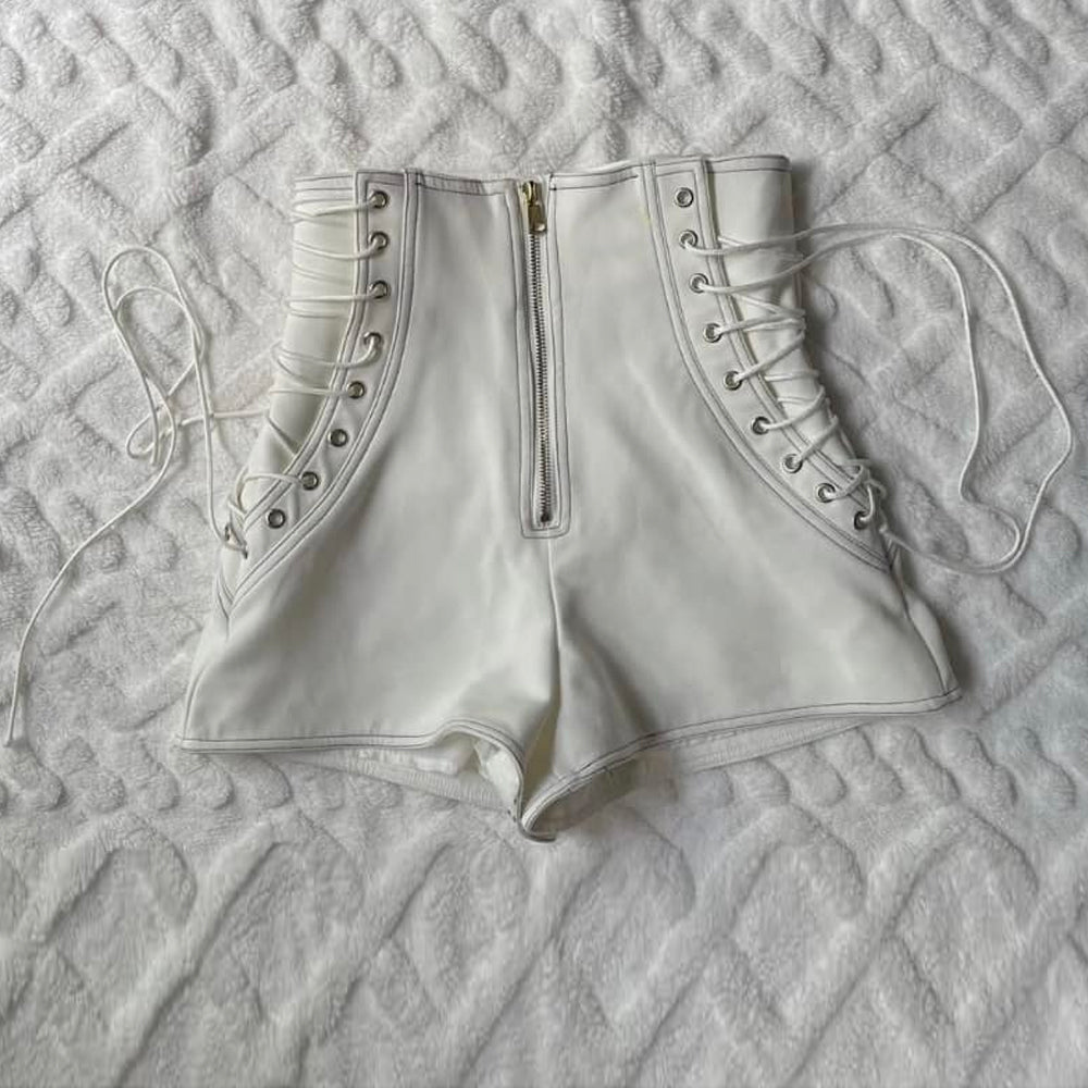 Lightweight, breathable white leather shorts perfect for summer.