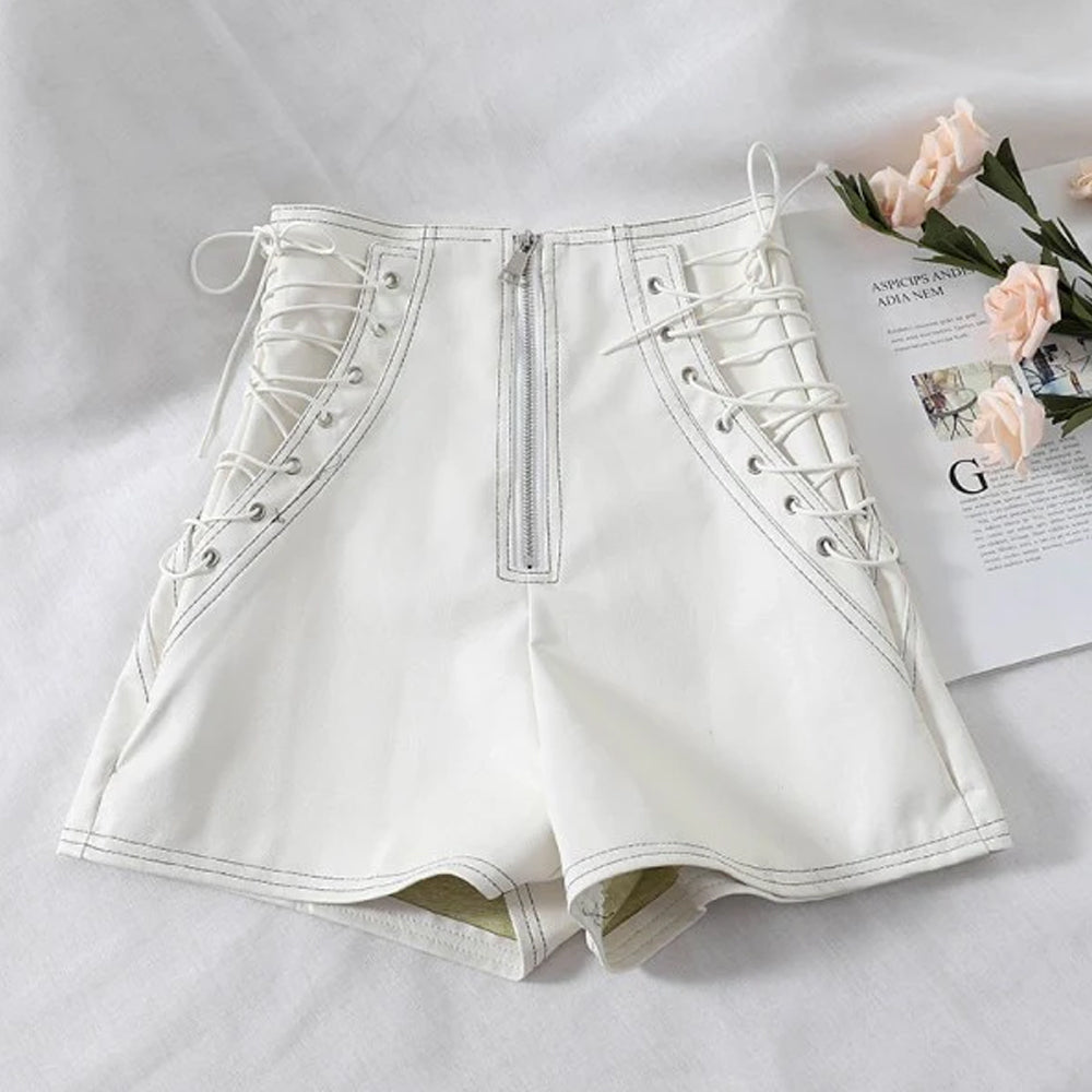 Side angle of laced-up white leather shorts for women.