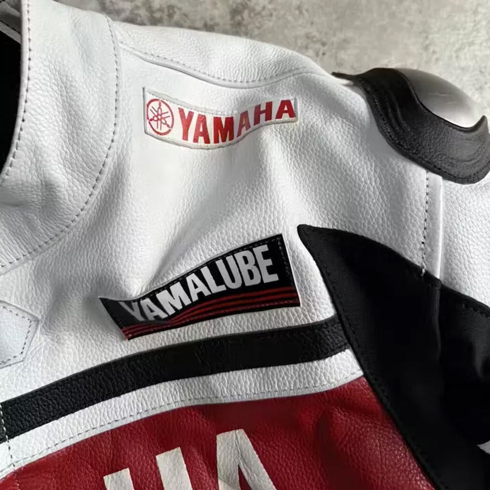 Close-up of Yamaha Racing white cowhide leather jacket shoulder protector for rider safety