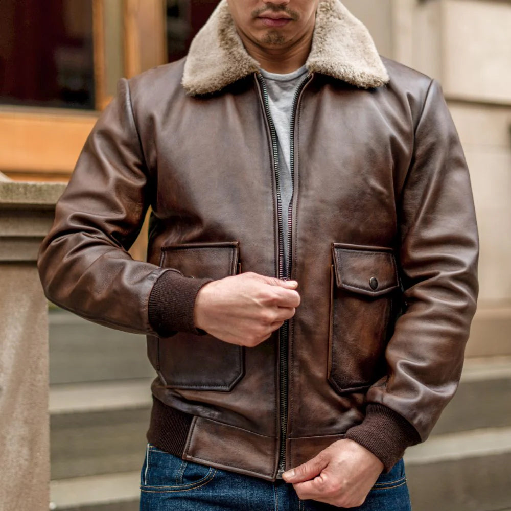 Anejo-finish leather jacket zip-front detail worn by model on city street