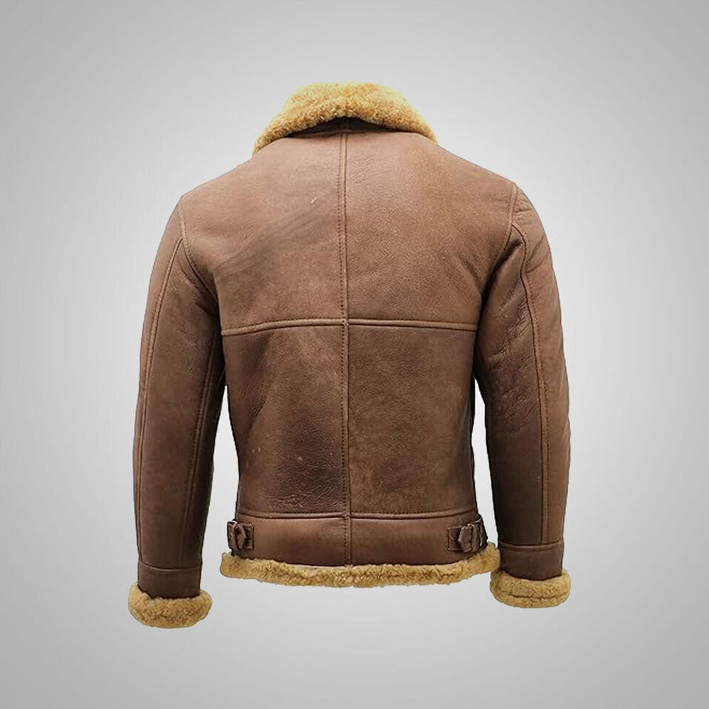 Back view of antique brown B3 bomber jacket displaying seam tape overlays and waist adjustment buckles