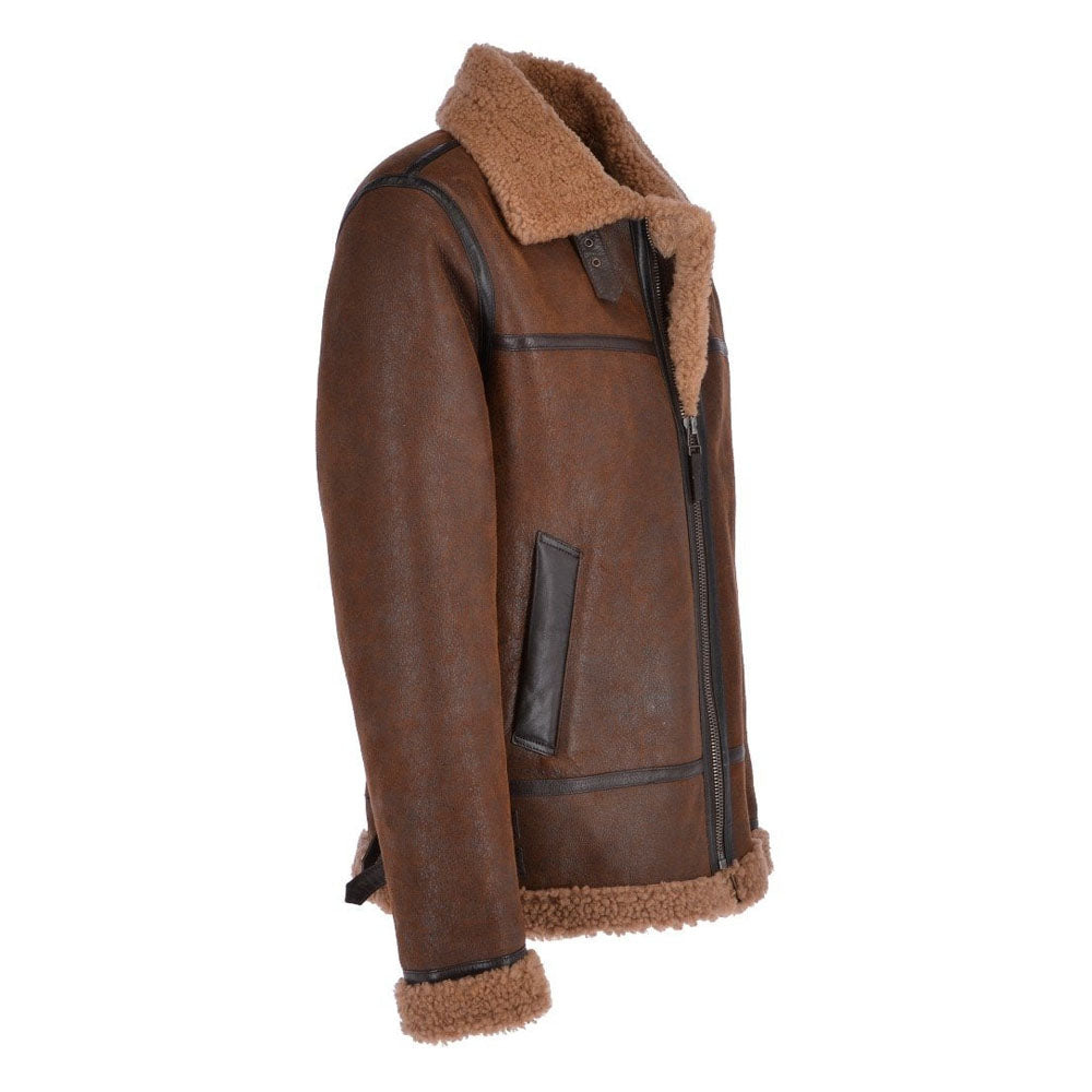 Side profile of antique brown shearling jacket highlighting brown curly fur collar, throat latch strap, and heavy YKK front zip