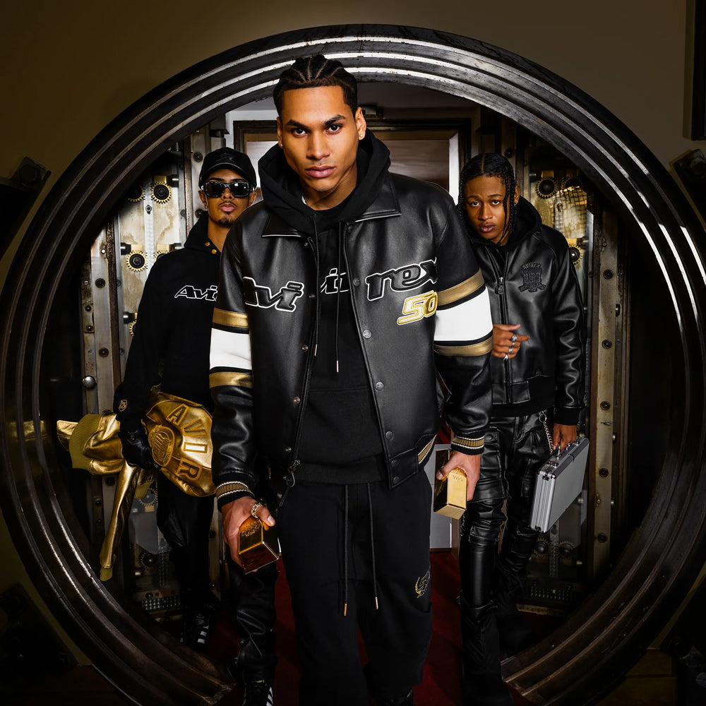 Group campaign scene featuring the black Avirex Iconic leather bomber beside graphic varsity and hooded leather styles