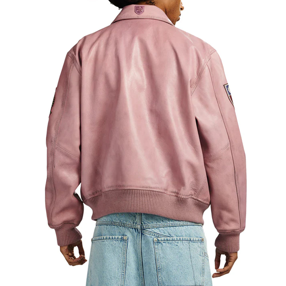 Rear view of model wearing pink Avirex lambskin flight A2 jacket
