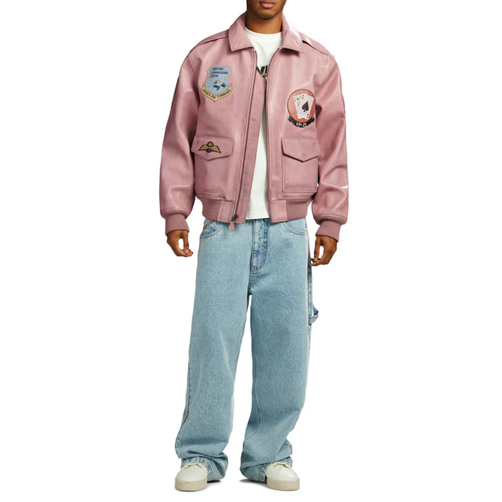 Full view of pink Avirex bomber jacket styled with baggy jeans