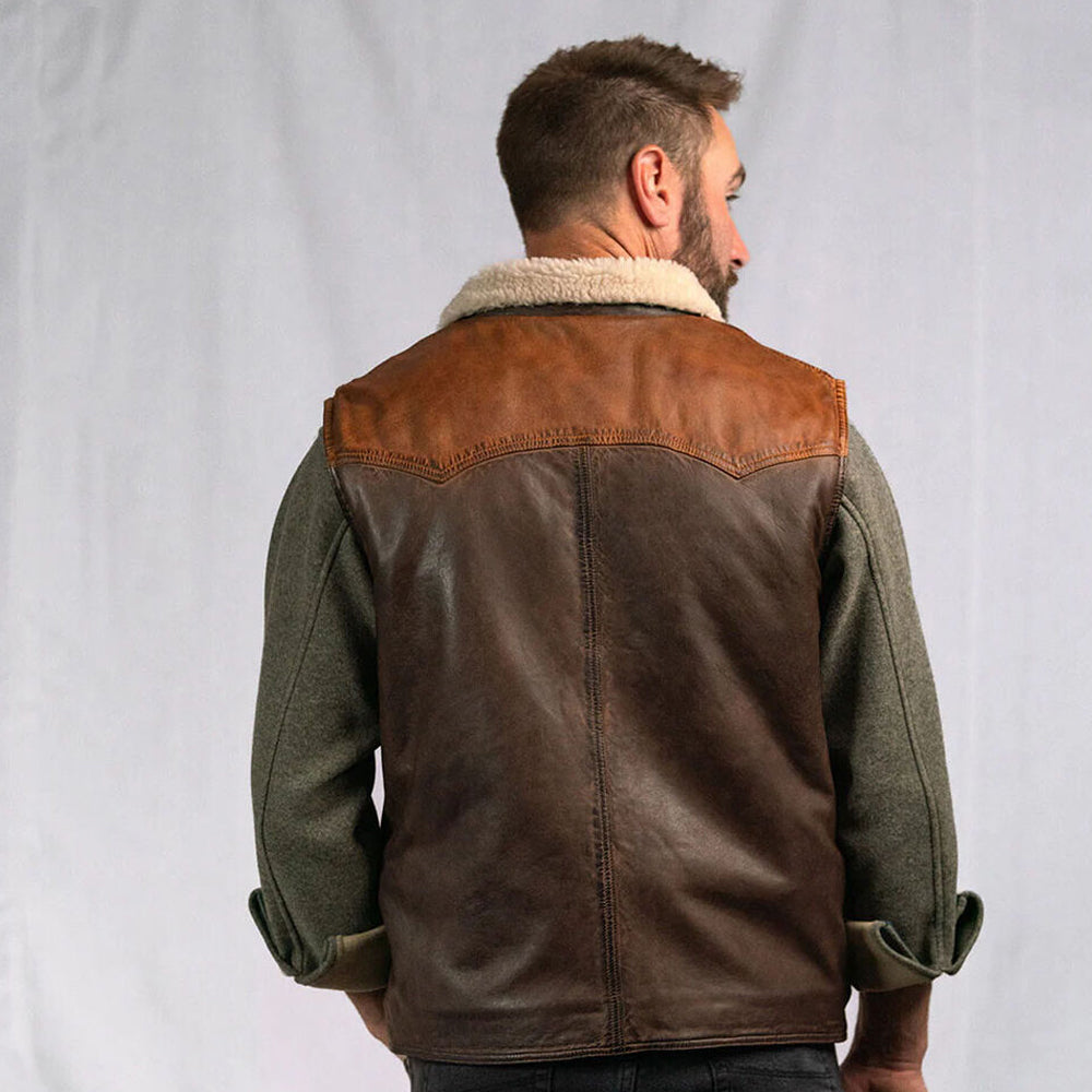 Rear lifestyle view of a man showcasing the solid back and cream wool trim.