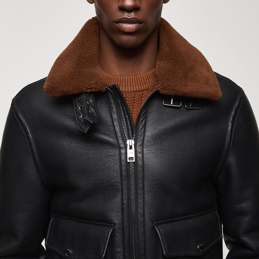 Close up chest view of black B3 bomber jacket with open tobacco brown fur collar and metallic zipper