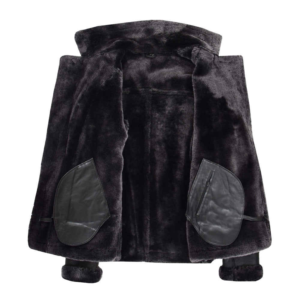 Interior view of black shearling leather biker jacket showing full dark charcoal fur lining and zippered interior leather pocket