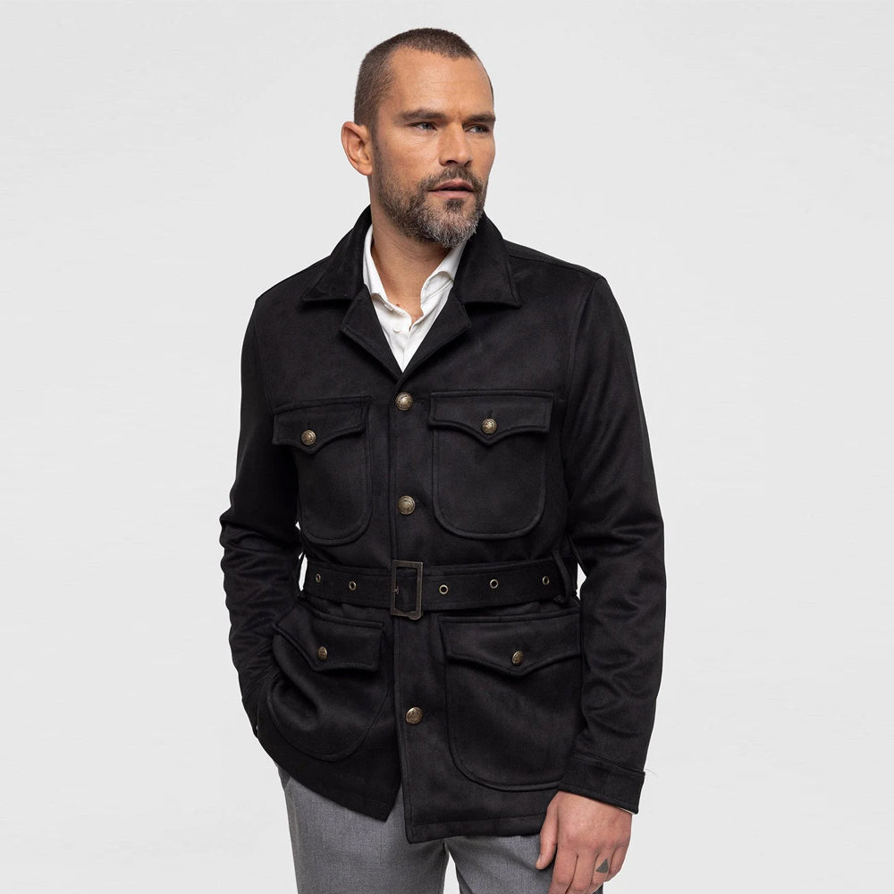 Close-up of black suede jacket showing chest flap pockets
