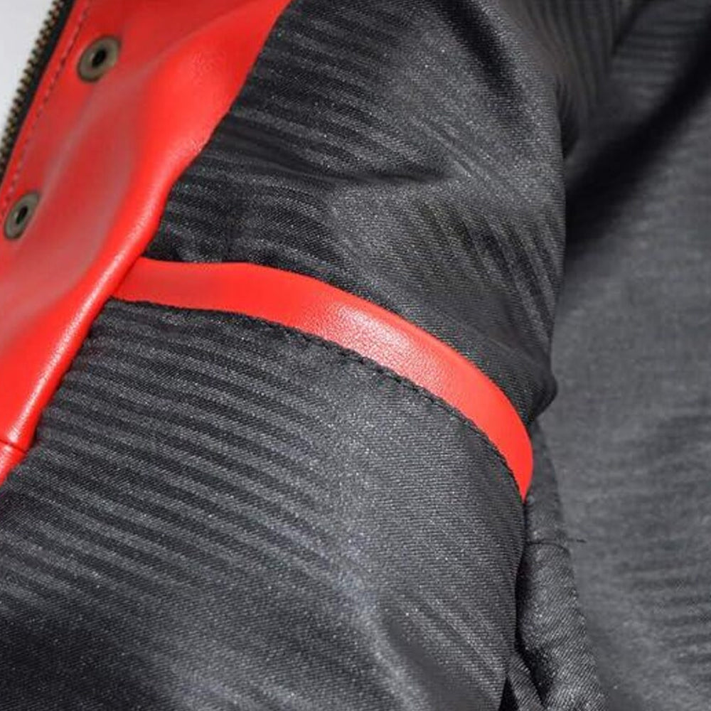 Close-up of black viscose lining and red leather interior trim construction