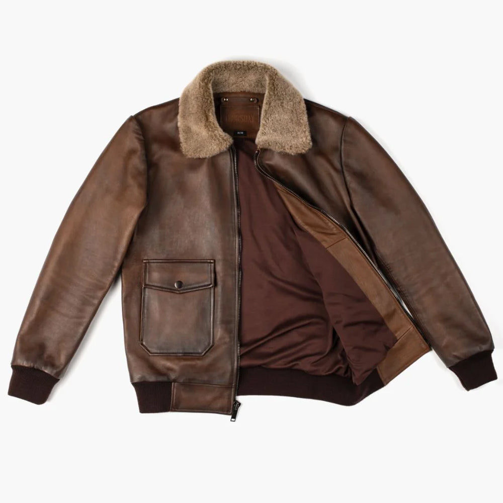 Open brown leather flight jacket showing dark polyester lining and leather trim