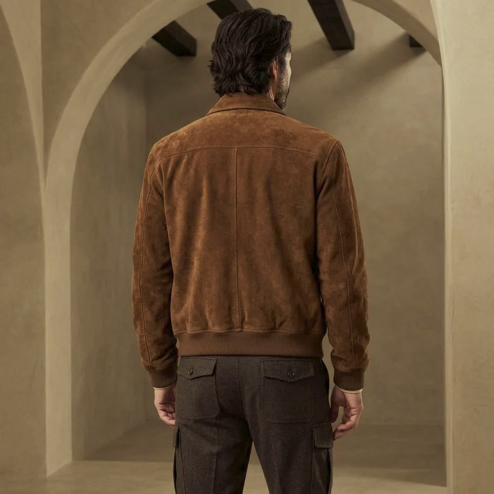 Rear view of brown suede A-2-inspired bomber with horizontal shoulder yoke, center-back seam, shaped sleeves and full ribbed waistband.