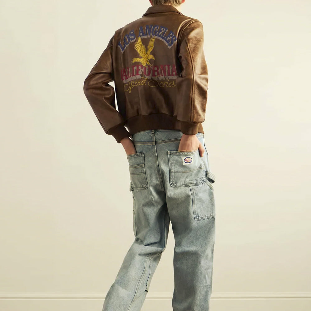 On-model back view of California Speed Series leather bomber highlighting the faded West Coast eagle artwork