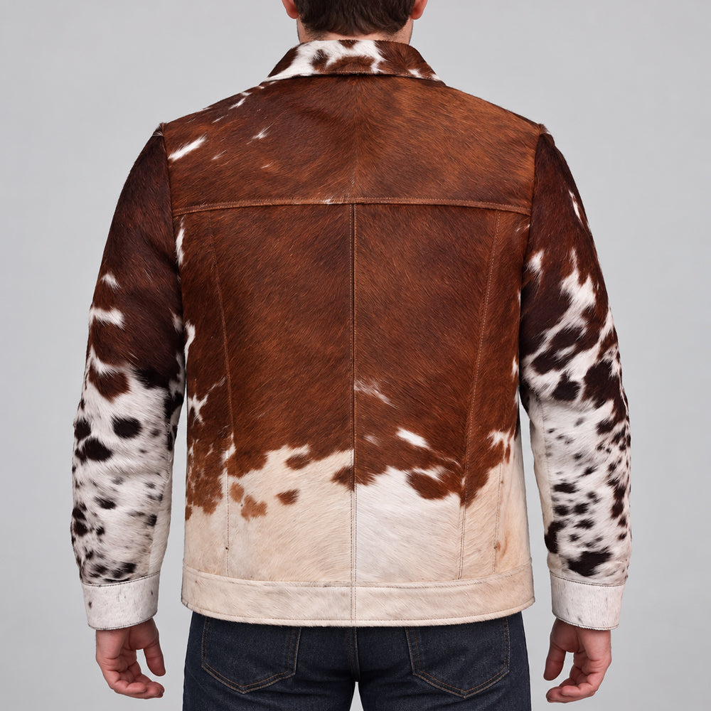 Rear view of chestnut and ivory cowhide trucker jacket with shoulder yoke, center seam and paneled back