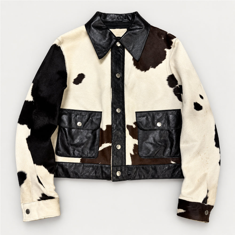 Front view of cream black and brown cowhide Western jacket with five-snap placket and flap pockets