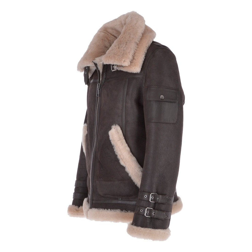 Side view of dark brown shearling pilot coat showing left sleeve bicep utility pocket with snap button and dual wrist belt straps