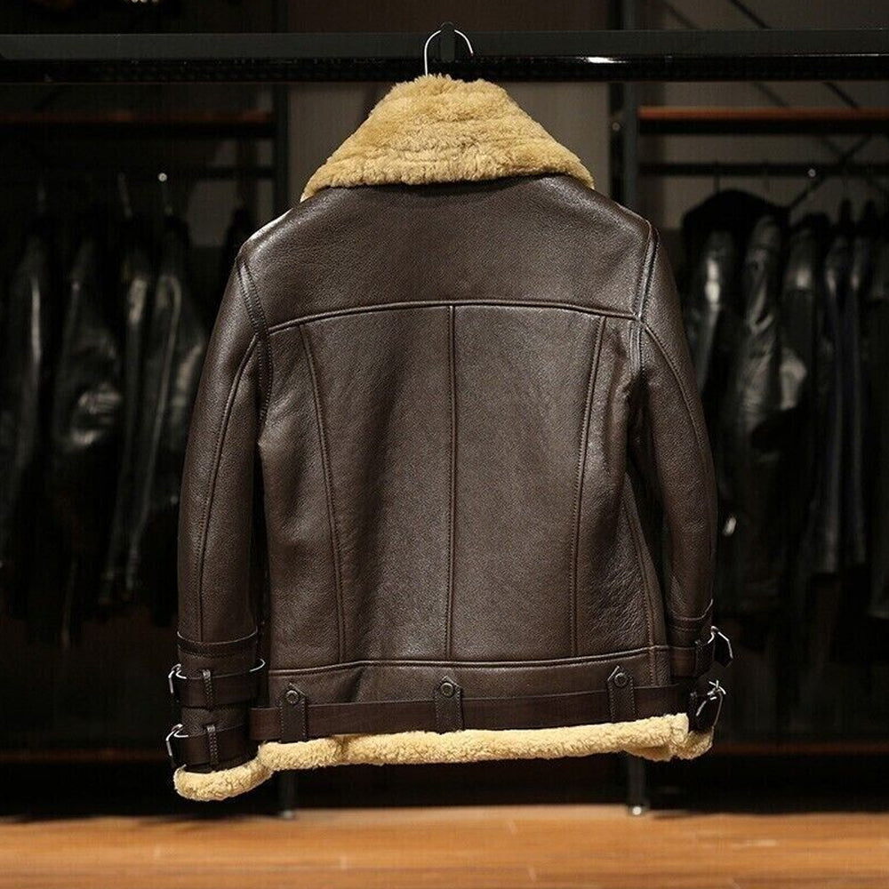 Back panel display of dark espresso shearling flight coat on hanger showing central spine seam and bottom fur trim
