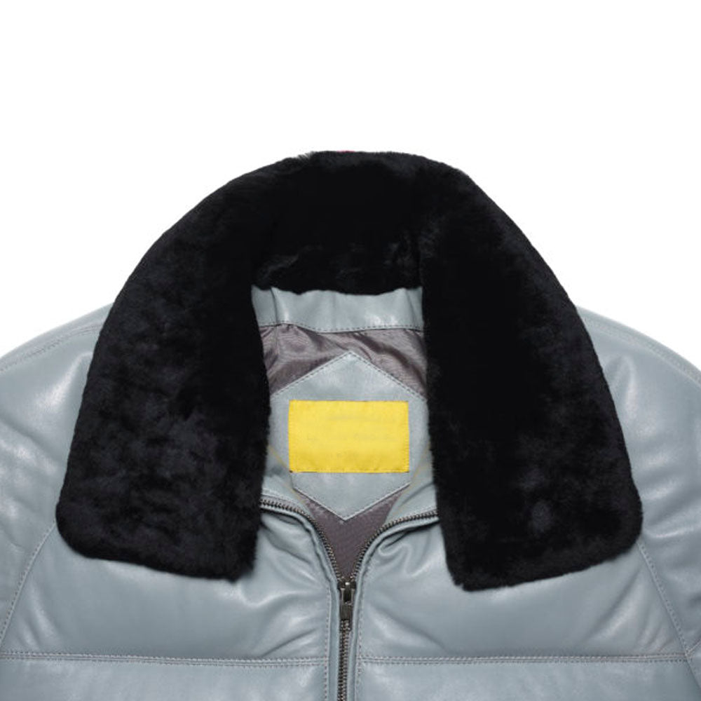 Close-up of the detachable black sheep wool collar and stud-fastened chin-guard on a grey V-bomber.