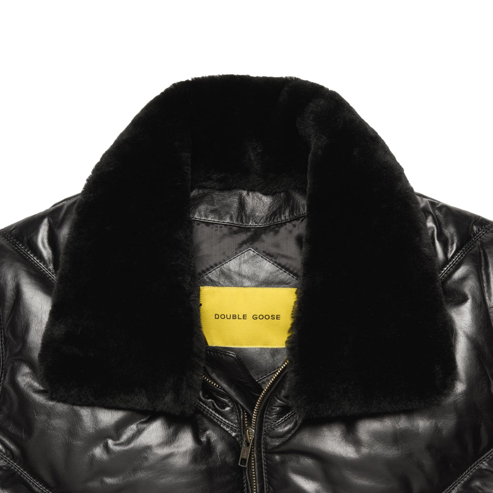 Close-up of black shearling collar with yellow Double Goose woven label inside leather jacket