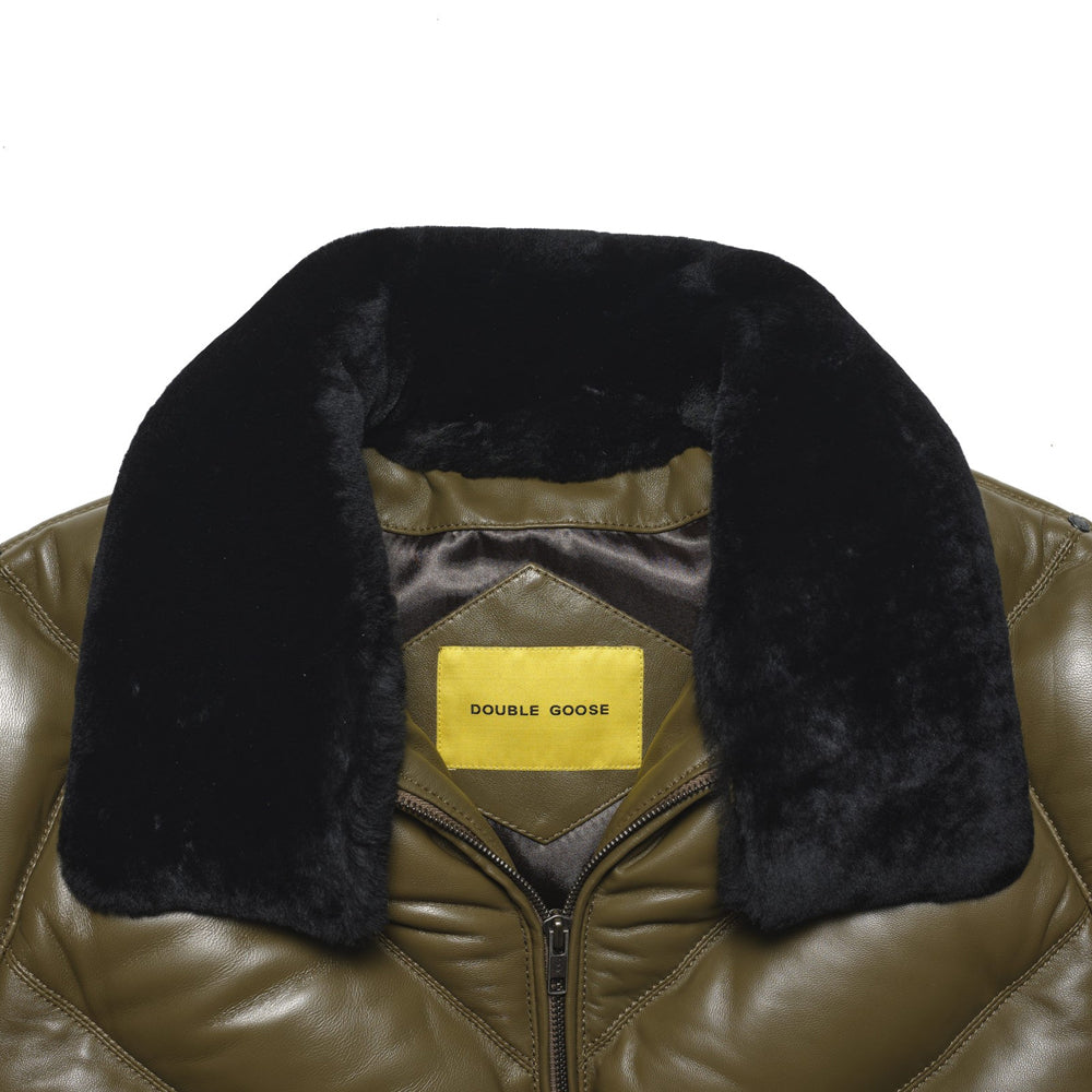 Close-up of Double Goose leather jacket's detachable black shearling wool collar with branded label