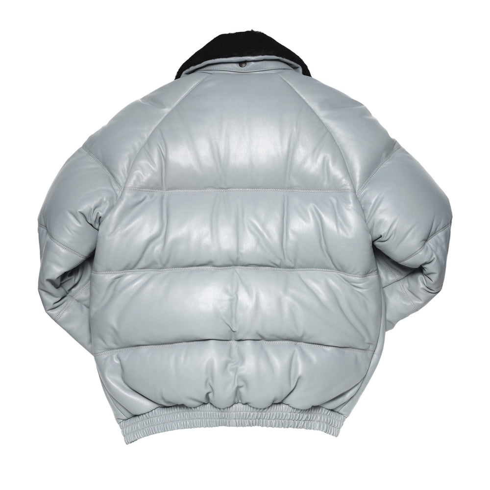 Back view of light grey leather puffer bomber showing Double Goose's horizontal quilted down-fill panels