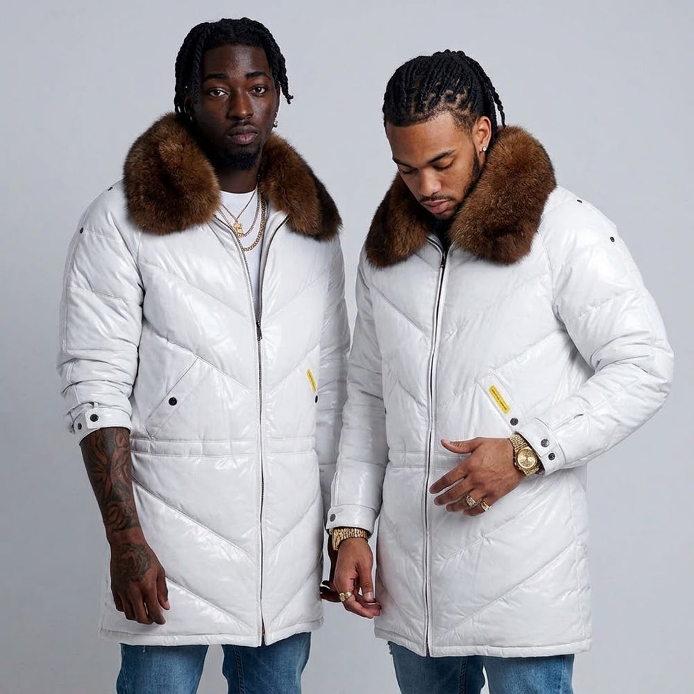 Two men wearing matching off-white leather V-coats with fur collars, street style