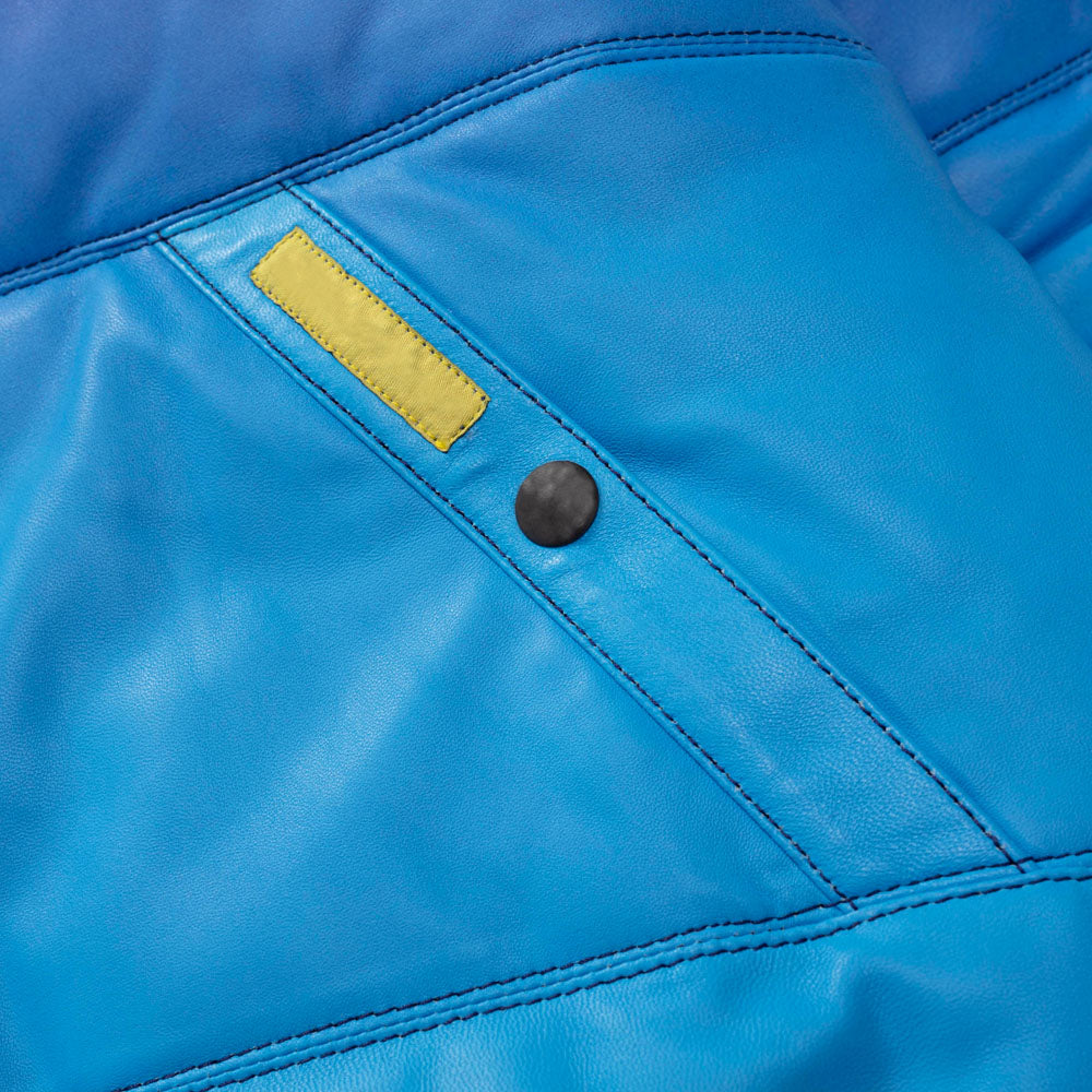 Close-up of the welt pocket featuring co-branded yellow label and branded snap-button closure.
