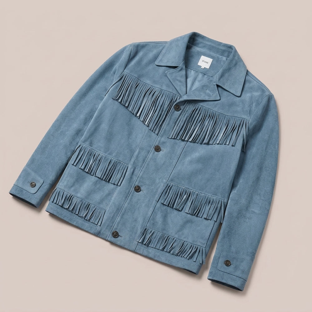 Flat-lay view of dusty blue suede Western jacket with fringe-trimmed patch pockets