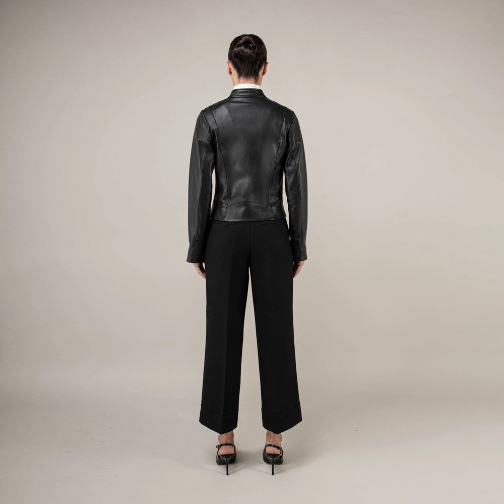 Rear model view of fitted women’s black leather jacket with a clean sculpted back