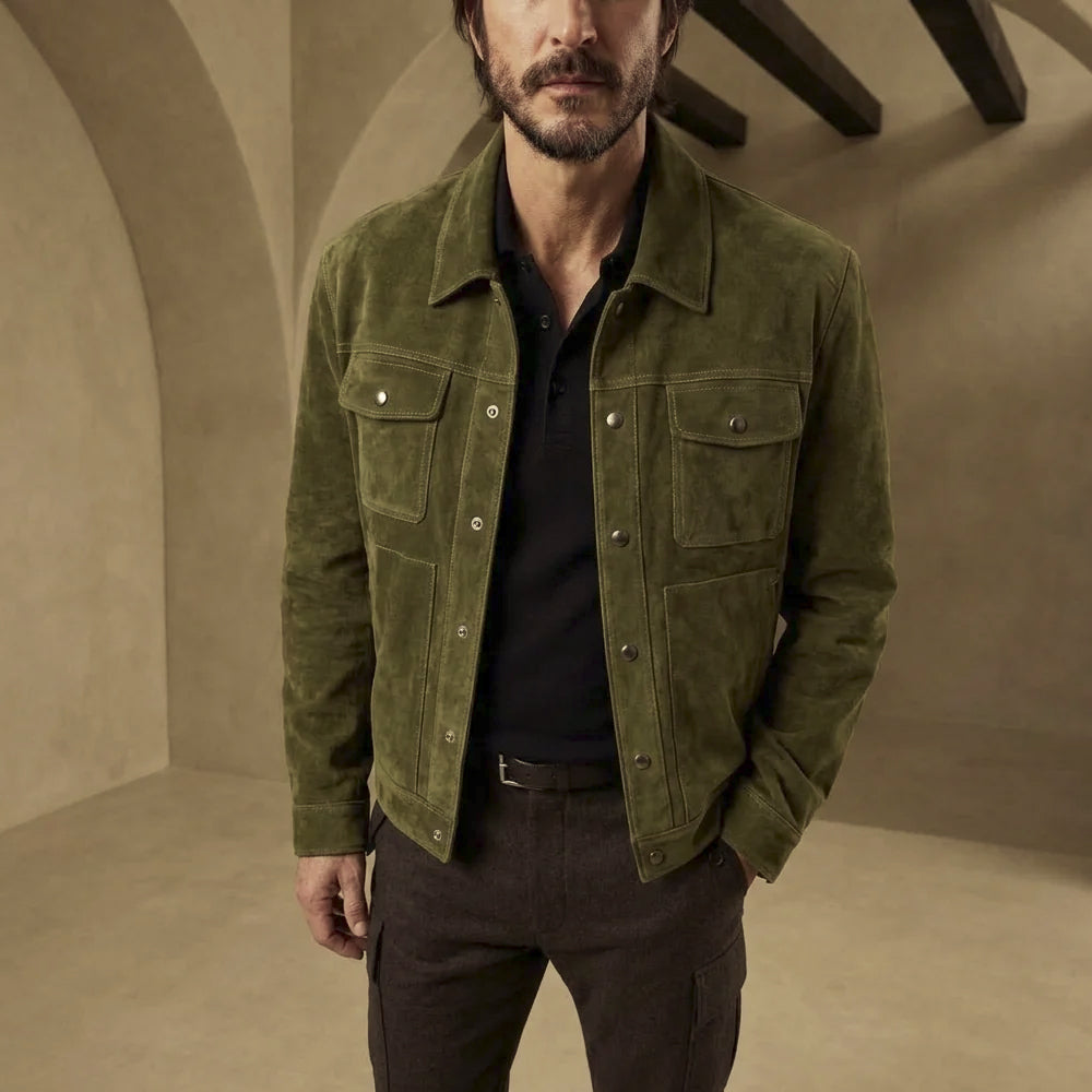 Close front view of forest green suede trucker jacket highlighting twin snap-flap chest pockets and vertical lower hand pockets.