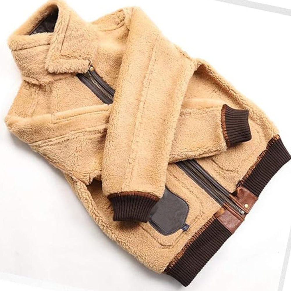 Reverse angle showing full beige shearling wool lining and heavy-duty front brass zipper