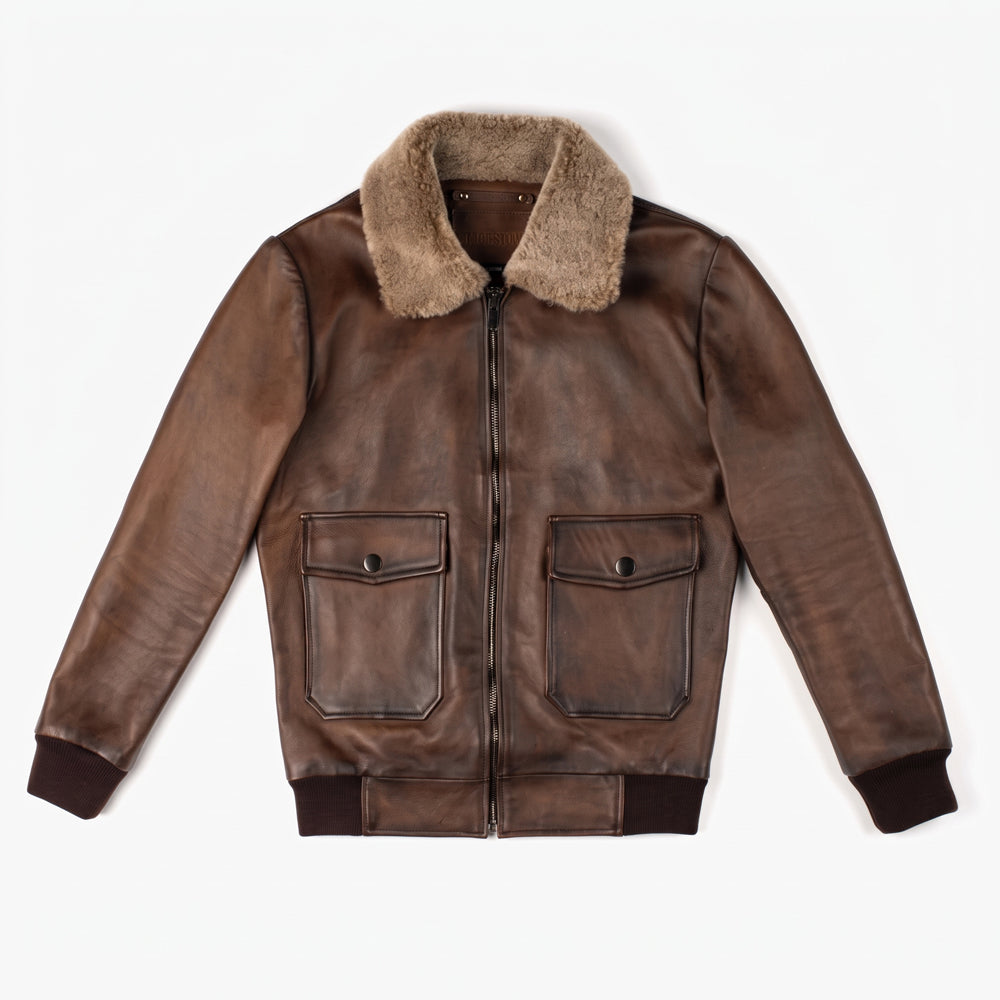 Front view of men's full-grain leather A-2 bomber jacket with taupe shearling collar