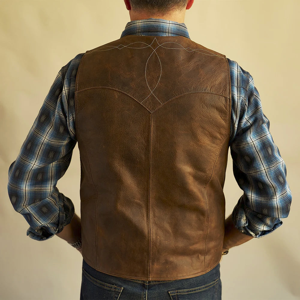 Rear fit of men’s brown bison leather vest with full leather back, center seam and shaped Western yoke