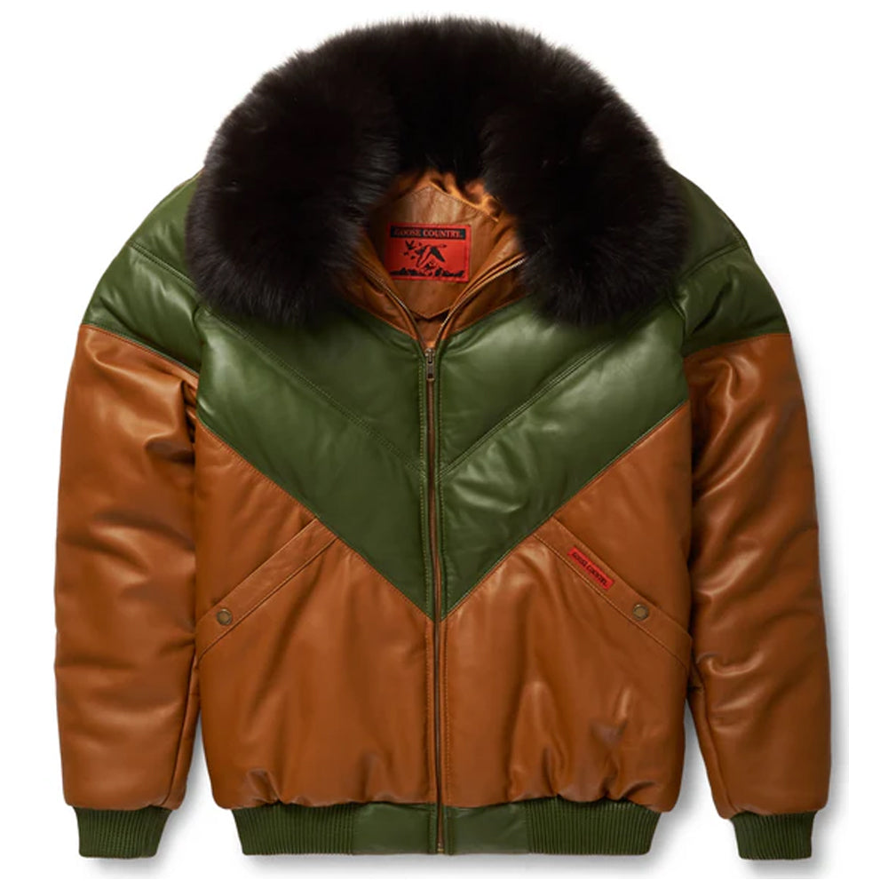 Front view of the Goose Country men's tan brown and olive green leather V-bomber jacket showing chevron panels and dark brown fox fur collar.