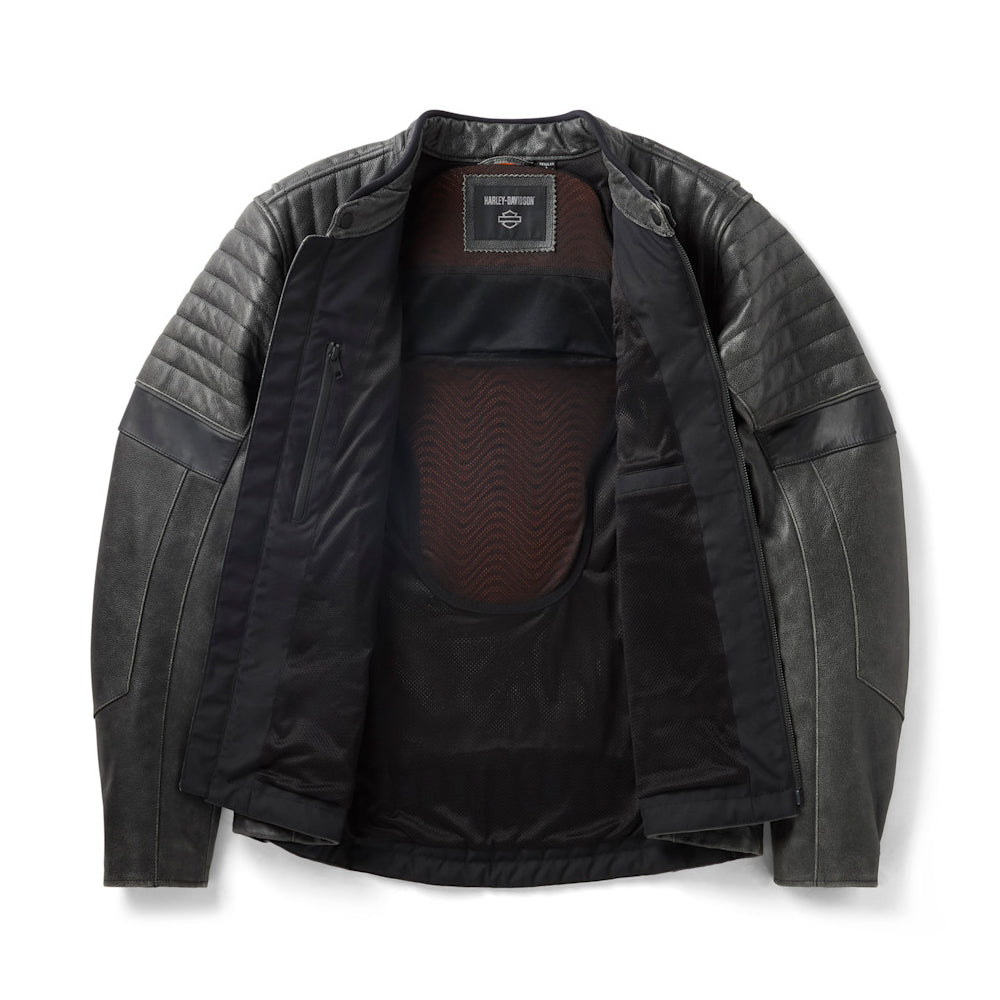 Interior view showing the mesh lining, internal stash pocket, and the back body armor pocket on the Passing Link III jacket.