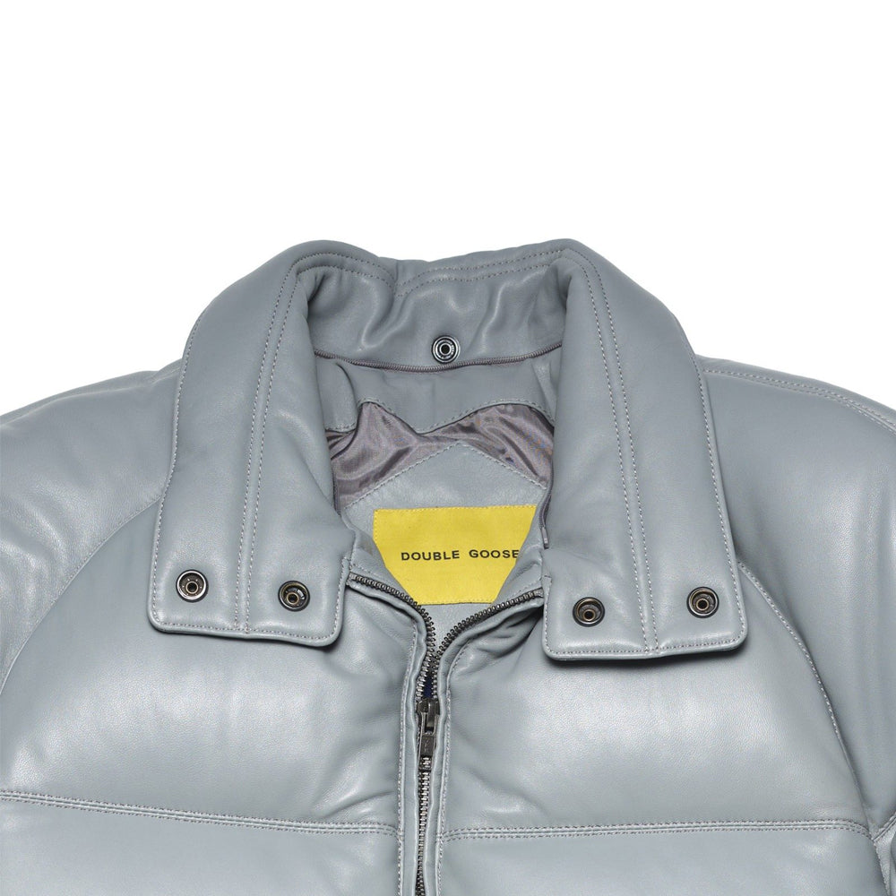 Light grey lambskin racer-style collar detail with exposed snap hardware for the removable fur trim