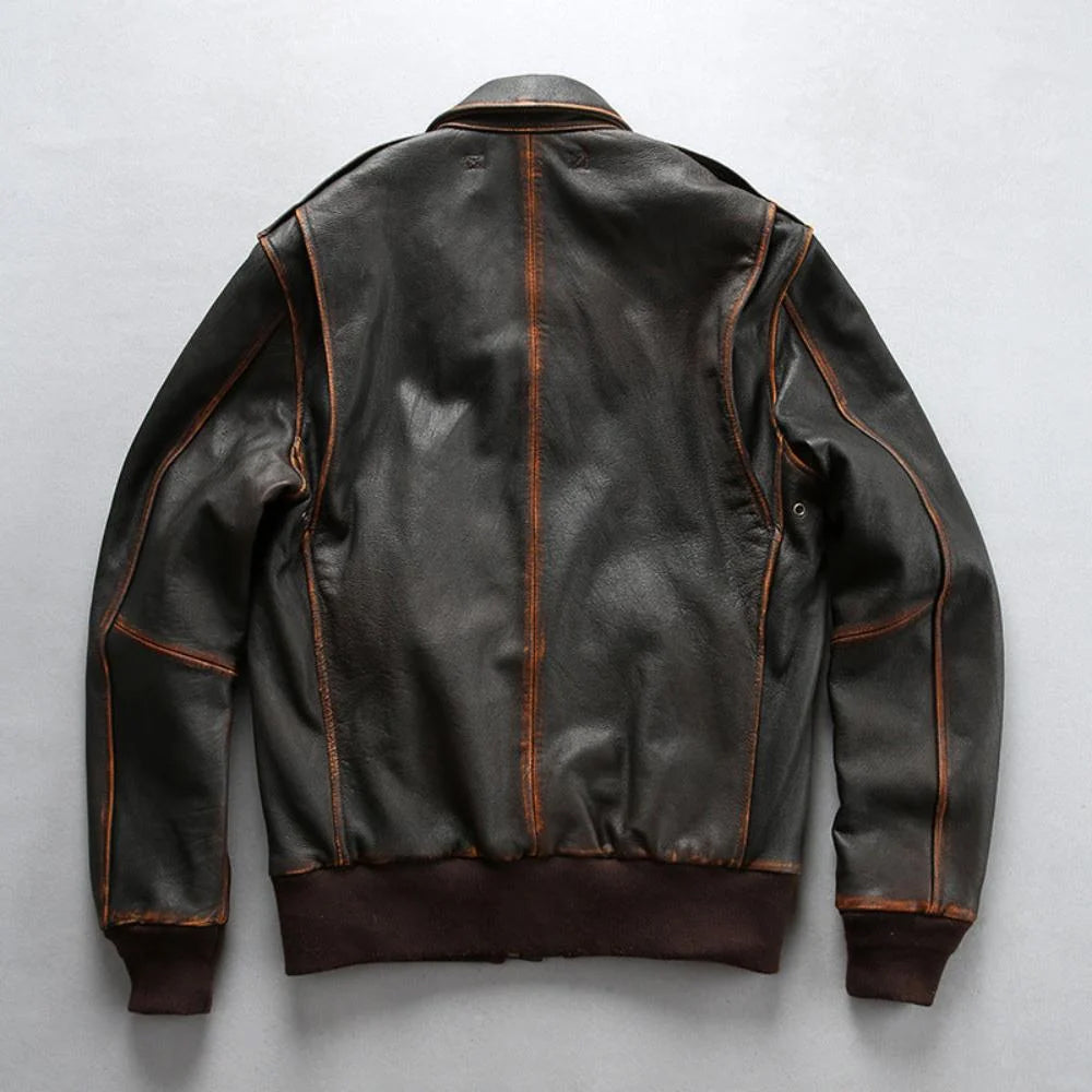 Rear flat lay view of men's distressed A-2 goatskin bomber jacket displaying bi-swing action back gussets and center seam.