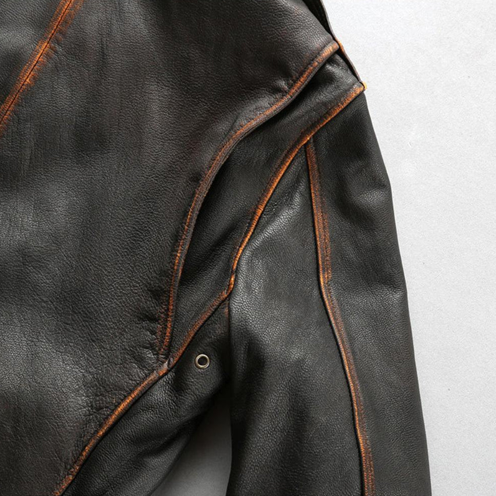 Detail shot of underarm metal ventilation grommet eyelet and bi-swing shoulder gusset seam on A-2 jacket.