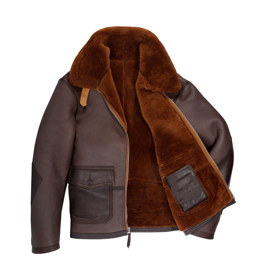 Open-front view of men's AN-J-4 flight jacket showing plush rust-brown shearling interior lining and internal leather patch pocket.