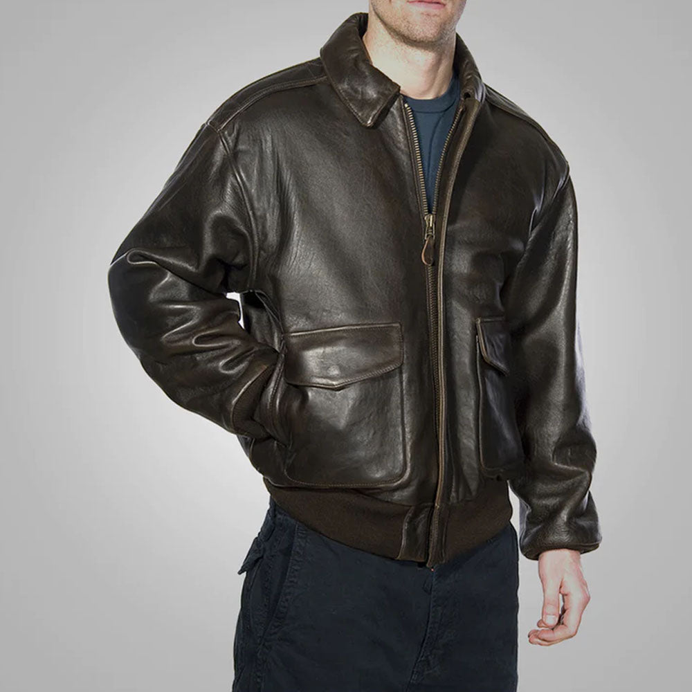 On-model view of men's antique brown A-2 bomber jacket demonstrating side-entry handwarmer pocket.