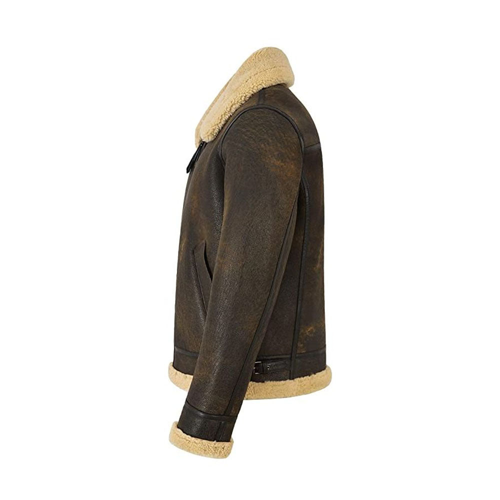 Side profile view of men's antique brown aviator jacket showing angled hand pocket with dark brown leather border and side waist belt