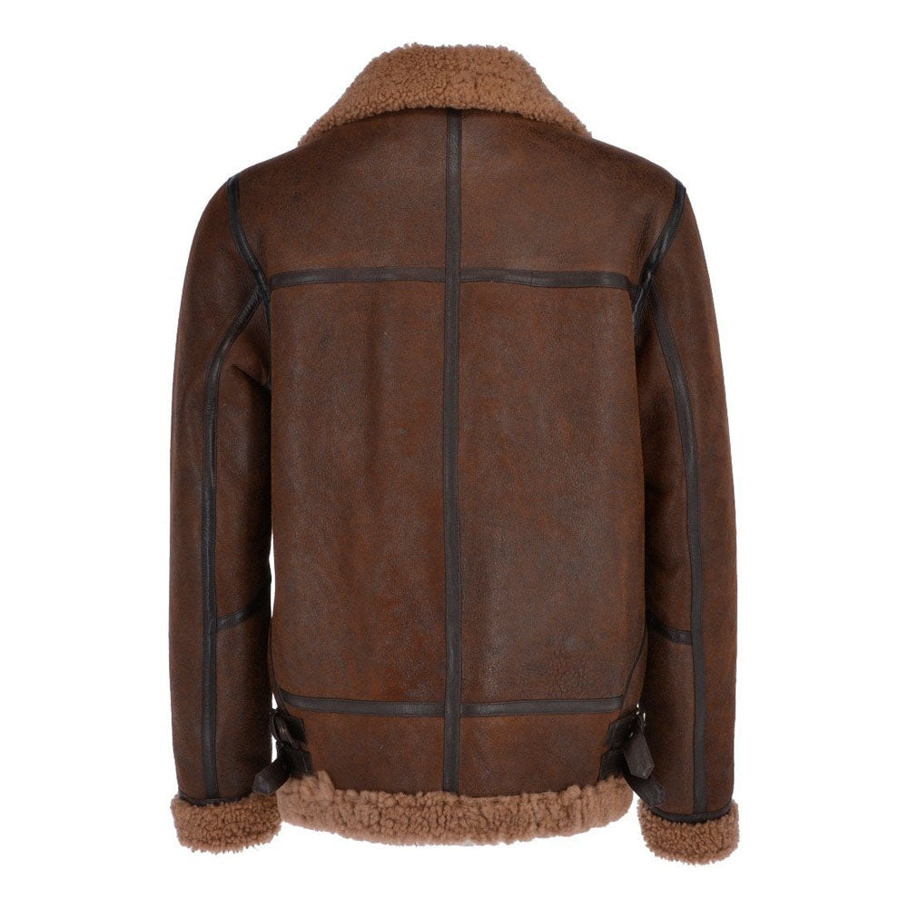Back view of men's antique brown B-3 flight jacket displaying cross panel piping lines, twin waist buckles, and curly fur hem