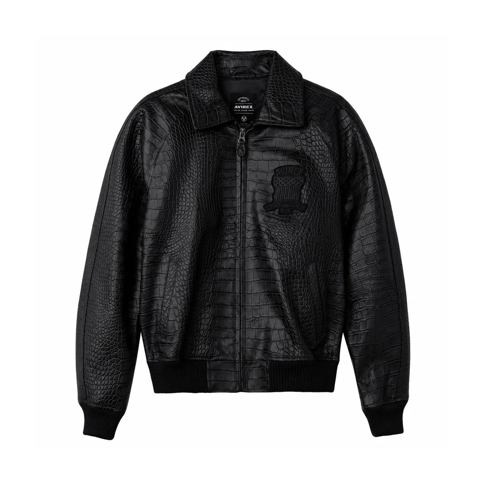 Front view of men’s black Avirex croc-embossed goatskin bomber with point collar, tonal chest crest and welt pockets