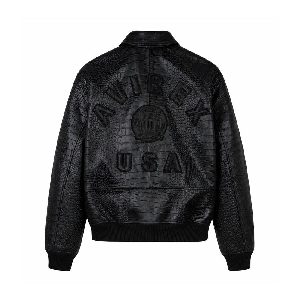 Back view of black Avirex crocodile-effect jacket showing raised AVIREX USA appliqués and central shield crest