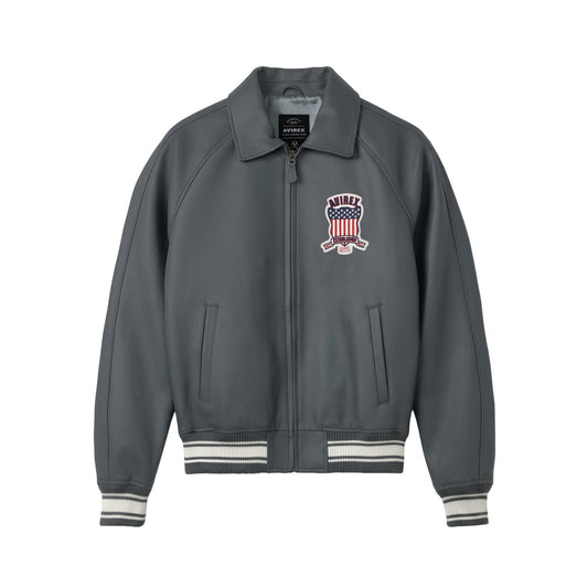 Front view of men’s Avirex gray Icon lamb leather bomber with patriotic chest crest, point collar and striped rib trim