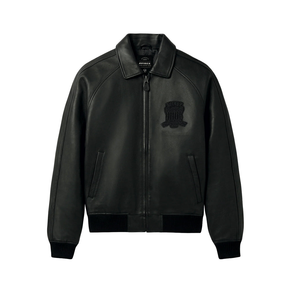 Front view of men’s Avirex Iconic black lamb leather bomber with tonal chest crest, point collar and solid rib-knit hem